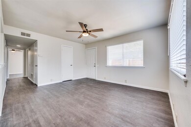 Unfurnished room featuring dark hardwood / wood-st