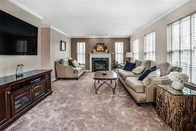 Wow!  You'll love relaxing in your spacious family room which is bathed in natural light from the plethora of windows and recessed lighting.  Keep warm by your gas fireplace.