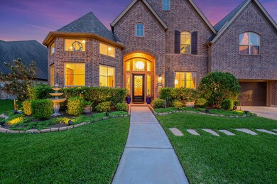 Close up of the front entry and landscaping.