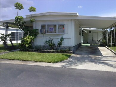Carport, patio,large shed and washer/dryer space