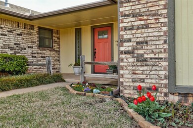 Entrance to property with brick siding