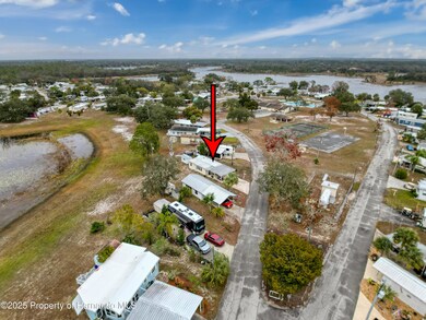 9321 Grizzly Bear Ln, Weeki Wachee, FL 34613 - photo 3