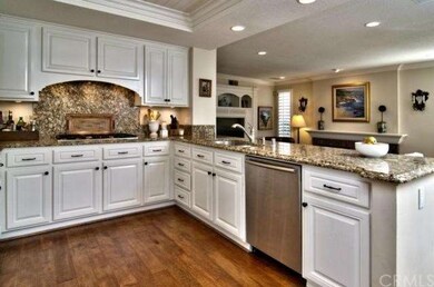 Kitchen looks out over the Family Room