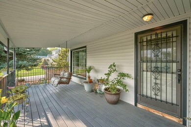 Covered front porch to take in view