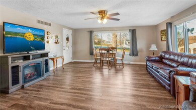 The large living space comes complete with new flo
