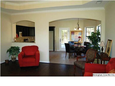 Very open plan with big arch doorways looking into