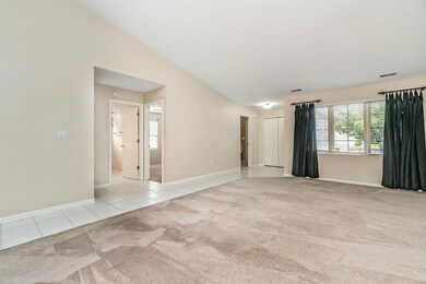 LIVING ROOM AND ENTRYWAY