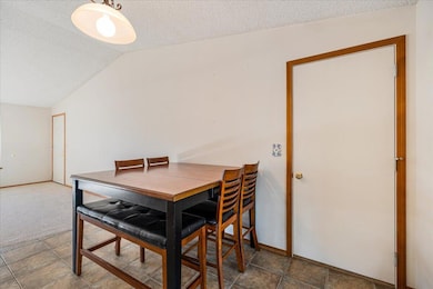 Dining area next to door to your garage