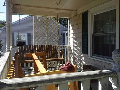 Exterior Front. Large front porch with swing.