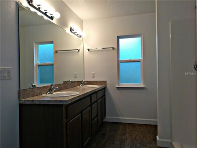DOUBLE SINK MASTER BATH WITH PRIVACY WINDOW