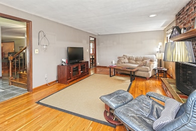 Family Room, Hardwood floors, Gas insert FP. Walk thru to Kitchen