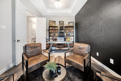 The spacious office on the right as you walk in the home