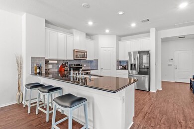Kitchen featuring stainless steel appliances, a p