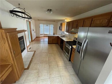 309 W Laredo Trail, Raymore, MO 64083 - photo 3