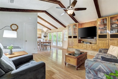 The living room flows seamlessly through the dining space, and into the kitchen, creating the perfect space for quiet evenings at home, or entertaining family and friends.