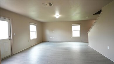 Empty room featuring plenty of natural light, lig