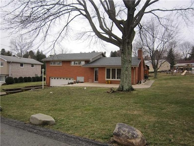 Exterior Front. Large corner Lot, beautiful stampe