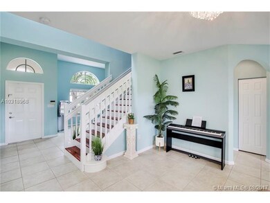 Main entrance and hardwood staircase