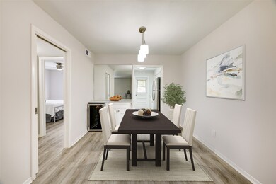 This open living, dining and kitchen area is great