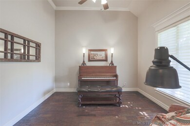 After entering home, office is to the right throug