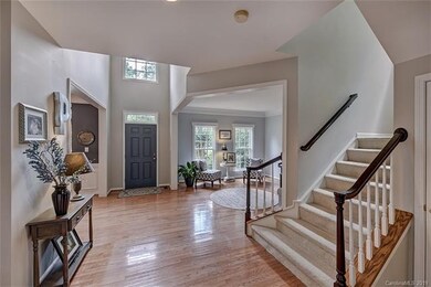 VIEW OF LIVING ROOM FROM FOYER