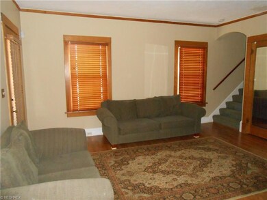 Living Room with newer wood laminate flooring.