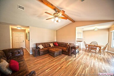 Vaulted beamed living room