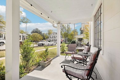 The covered front porch is cool, breezy and inviting.