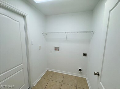 Washroom with washer hookup, hookup for an electri