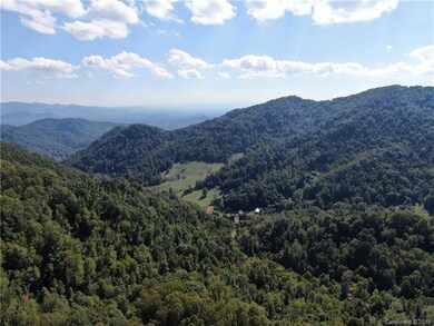 Center view facing away from dirt road.