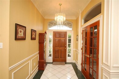 Foyer. Doors to right open to Dining Room or Offic