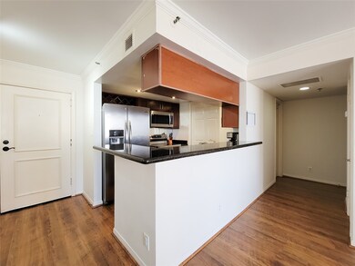 Modern kitchen with stainless steel appliances and