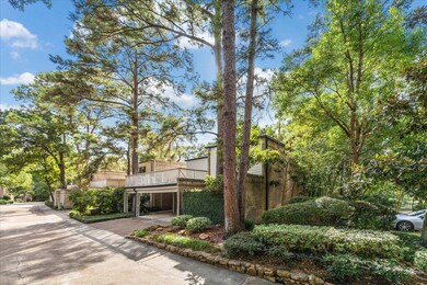 This charming 2 story townhome sits on a corner lot surrounded by mature trees and flourishing vegetation.