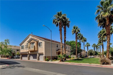 View of property with a garage and a residential v