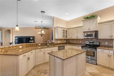 Kitchen featuring a sink, tasteful backsplash, a c