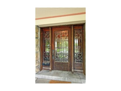 Wonderfully detailed leaded glass front door with 