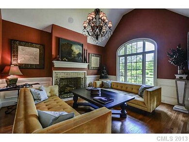 Parlor - Wood burning fireplace, 13' vaulted ceili