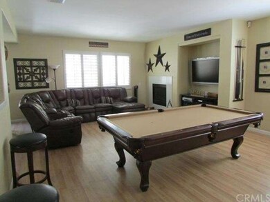 Great Room with plantation shutters.