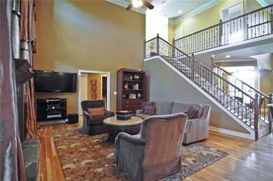 Beautiful Hardwood  Staircase with wrought iron spindles..
