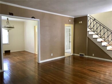 Shiny hardwood floors throughout the Living and Di