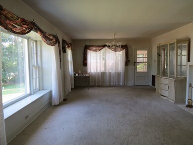 Large Living Room /Dining Room Combo, Fireplace, lots of windows for lots of natural light