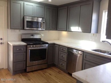 9th kitchen custom glazed cabs/marble