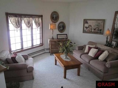 Formal living room, view is to front porch and Mai