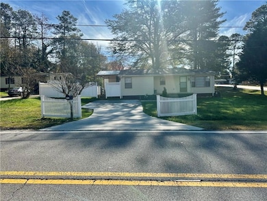 View of front of home with a front lawn