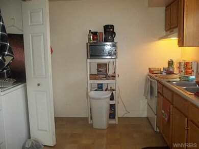 Kitchen. Double wide closet to the left for washer