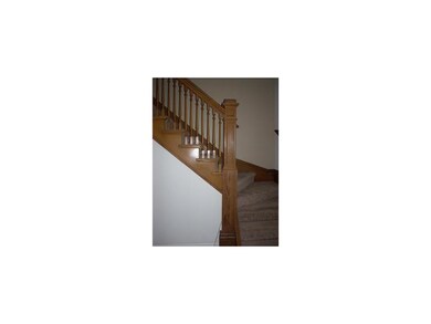 Other. Beautiful open stairway with original woodw