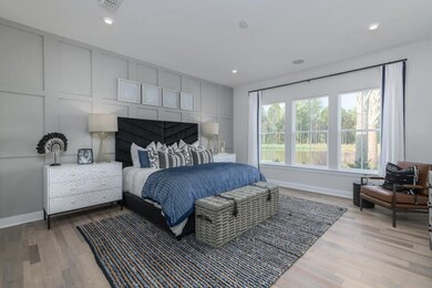 Owner's suite with feature wall