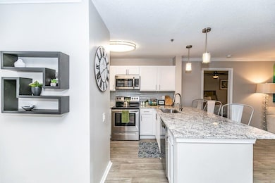 Kitchen featuring appliances with stainless steel 