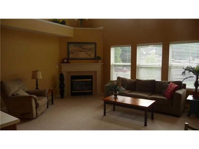 Great Room. Open and bright 2 story Great Room. Built in Entertainment center and gas fireplace.