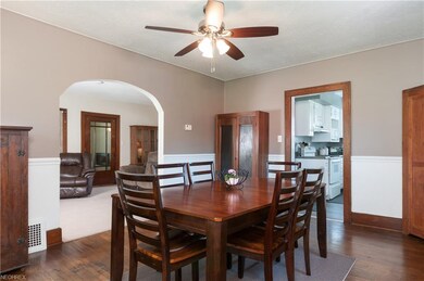 Dining room looking into family room and kitchen